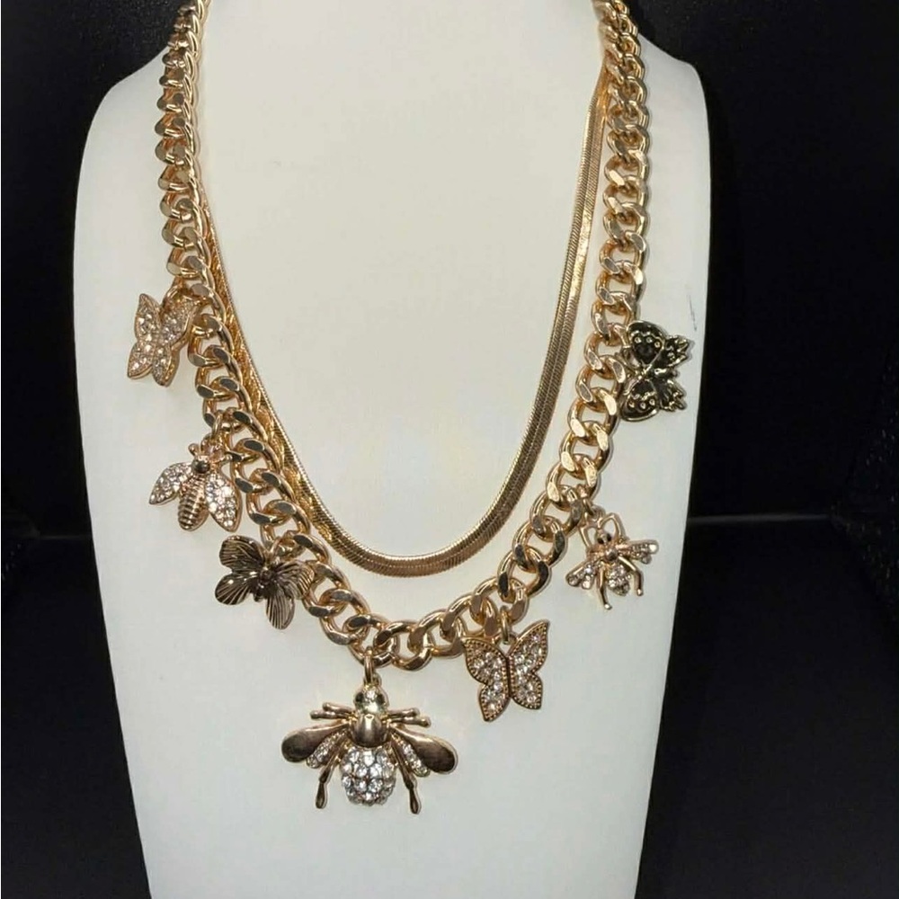 Gold Insect Charm Necklace bee and butterfly necklace.  New without tags.